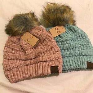 2x C.C hats with Pom Pom
